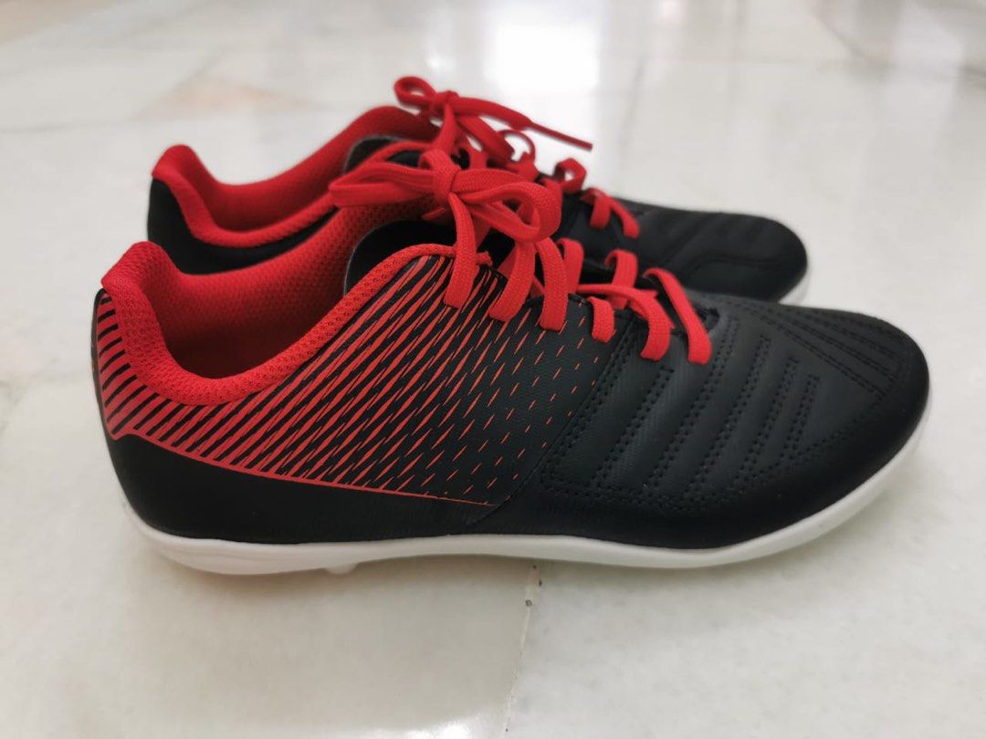 KIPSTA Hard Ground Football Boots Agility 100 HG Black Red Babies Kids Babies Kids Fashion on Carousell