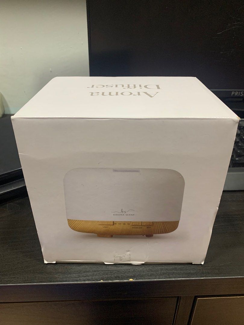 Kirona Diffuser (Category: Home Fragrance) located in Singapore. Submitted by xtreme_tsk (Listing ID 1275879354, Image 1). Description: BNIB, nvr opene 600ml Aroma Diffuser Kirona Brand (with wooden base) + 30ml Kirona Oil.
