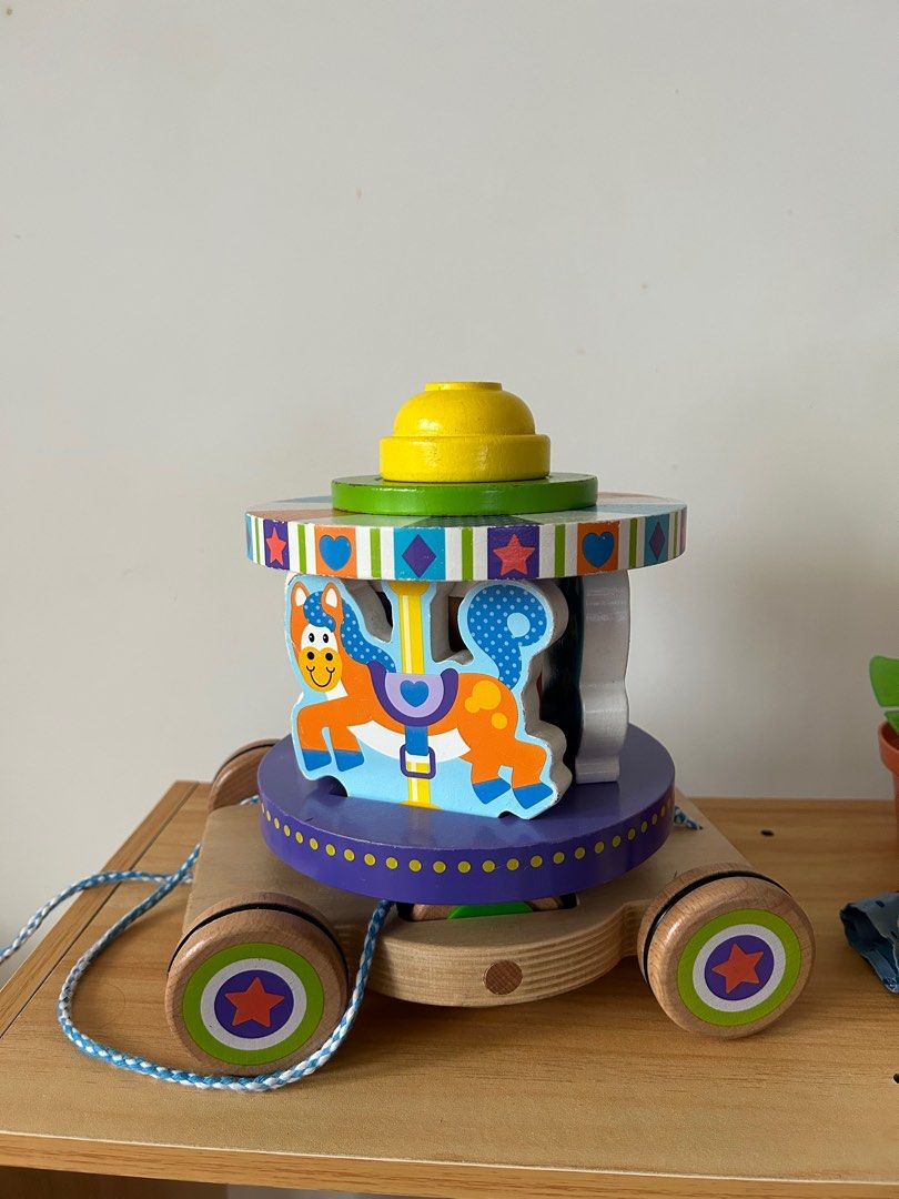 Melissa and doug sale carousel pull toy
