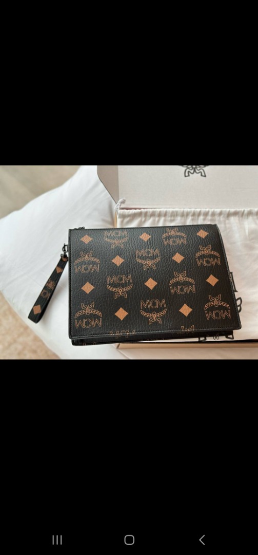 Mcm wristlet clearance bag