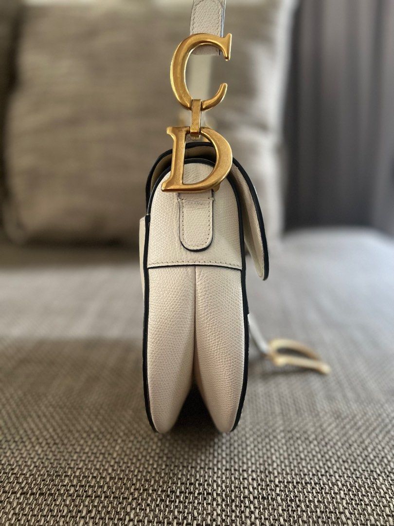 SALE! Authentic Dior Medium Saddle Bag Grained Leather White (Category: Luxury Bags & Wallets) located in Makati City. Submitted by kbernalcloset (Listing ID 1275691458, Image 3). Description: Comes with original dust bag.