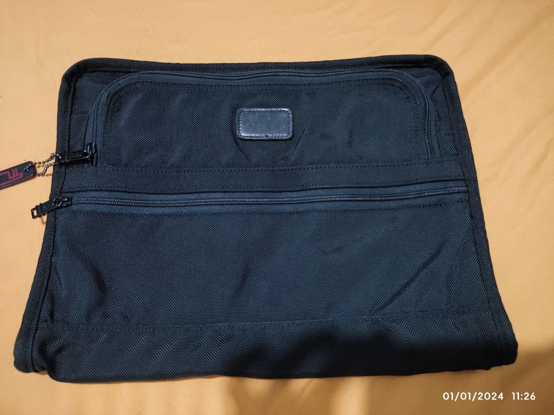 Tumi Laptop/Portfolio Large Pouch Bag (Category: Laptop Bags & Sleeves) located in Antipolo. Submitted by fantazma_23 (Listing ID 1275663132, Image 1). Description: Tumi Laptop/Portfolio Large Pouch Bag Good for 15-17in Laptops and Documents Very Good Condition Minimal fades on Zippers and Leather No hidden issues/holes/tears/stains Already cleaned Vintage Tumi Made in USA Tumi Tracer can be registered to new owner (see last 2 pix) Width: 16 inch