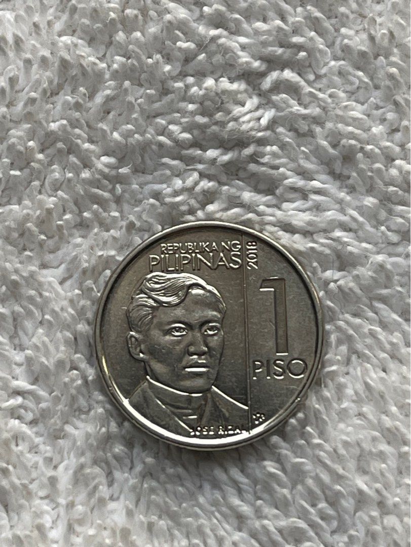 Error coin 1 piso NGC 2018 with high mint mark, HTF (Category: Currency) located in Valenzuela. Submitted by eternallyblessed587 (Listing ID 1270687055, Image 1). Description: This 1 peso 2018 Philippine coin with high mint mark is in very good condition. ‘I’ in Pilipinas is under ‘R’ in Republika. .