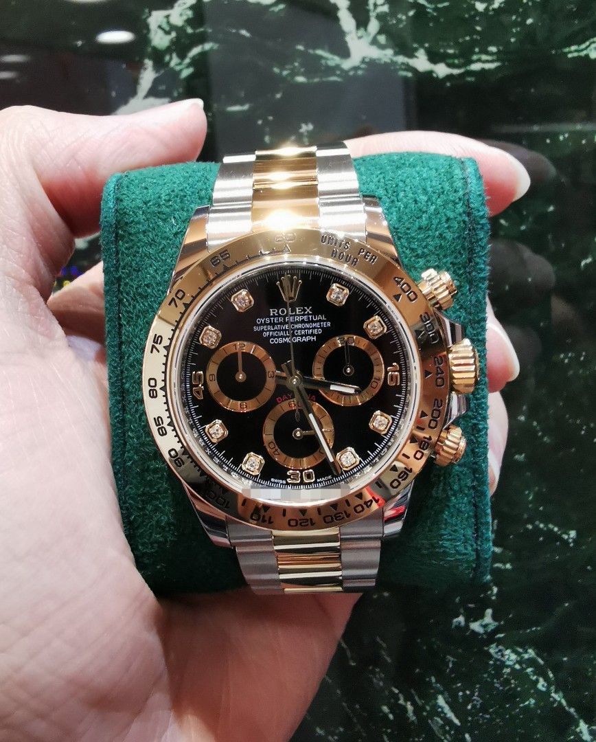 Gold daytona clearance black dial