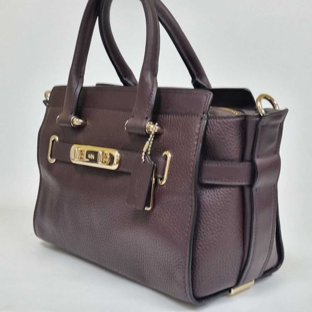 Authentic Coach Swagger 27 Oxblood F87295 New With Defect Women s Fashion Bags Wallets Cross body Bags on Carousell
