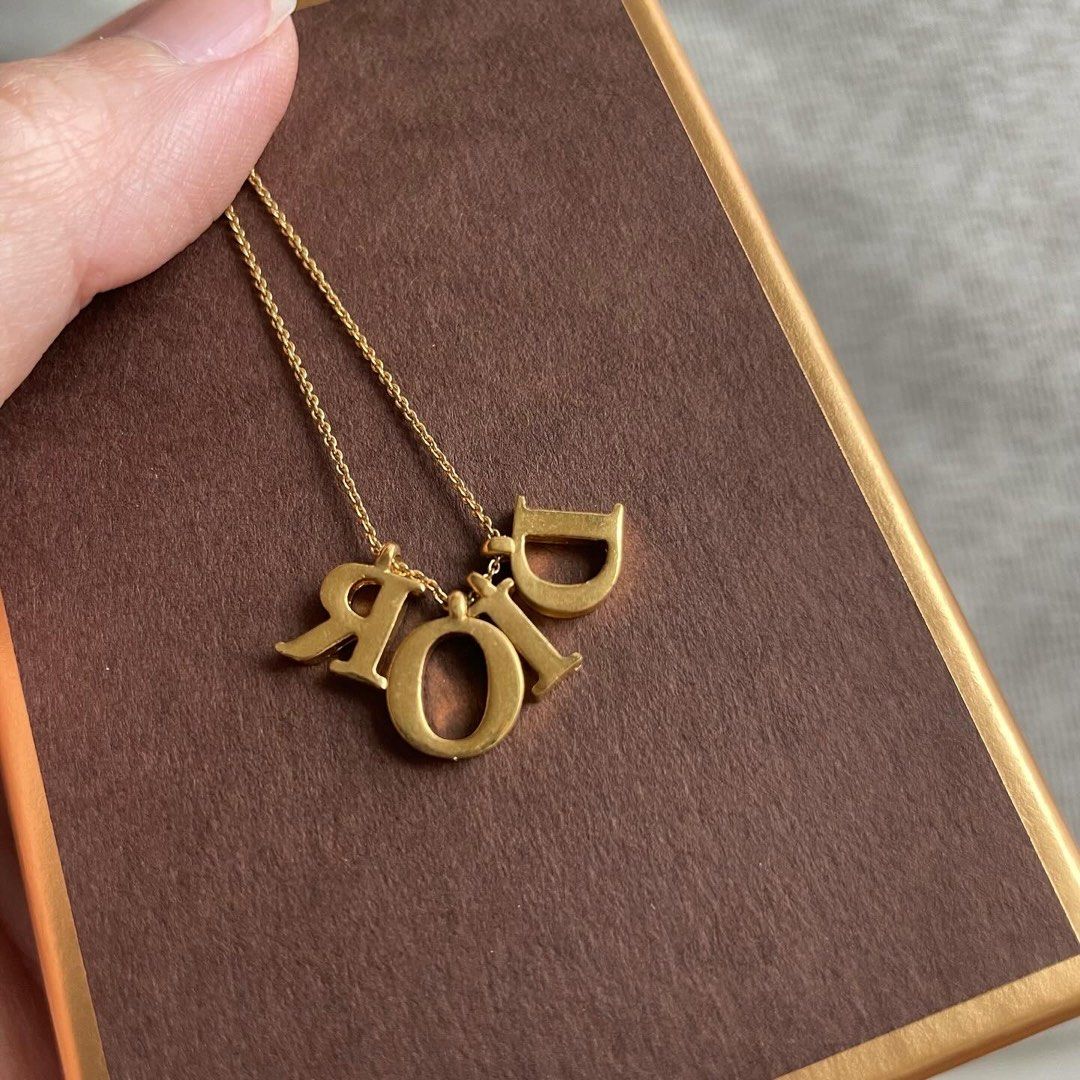 Gold dior clearance necklace