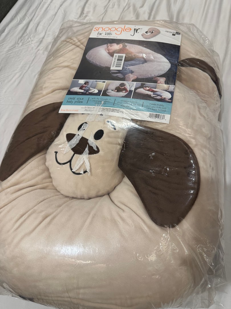 Brand new in packaging. Snoogle Junior Dog body pillow Babies
