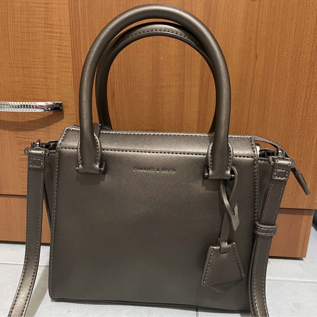 Charles and Keith Small City Sling Bag in Pewter Women s Fashion Bags Wallets Cross body Bags on Carousell