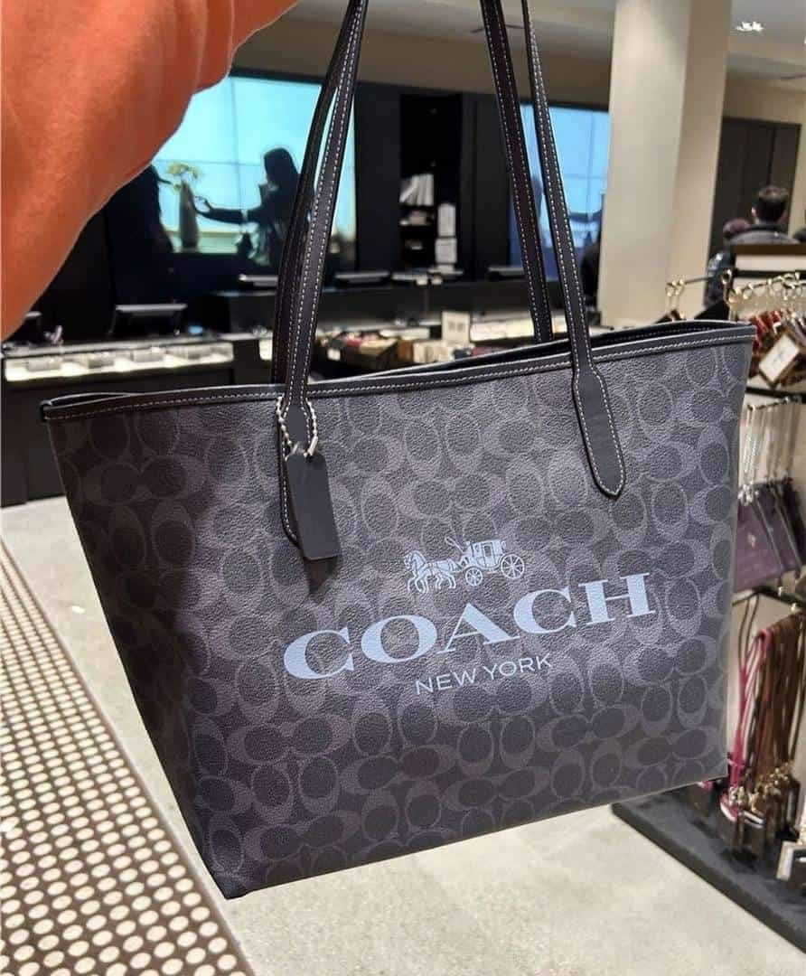 City zip tote online in signature canvas coach