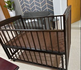 Crib including mattress
