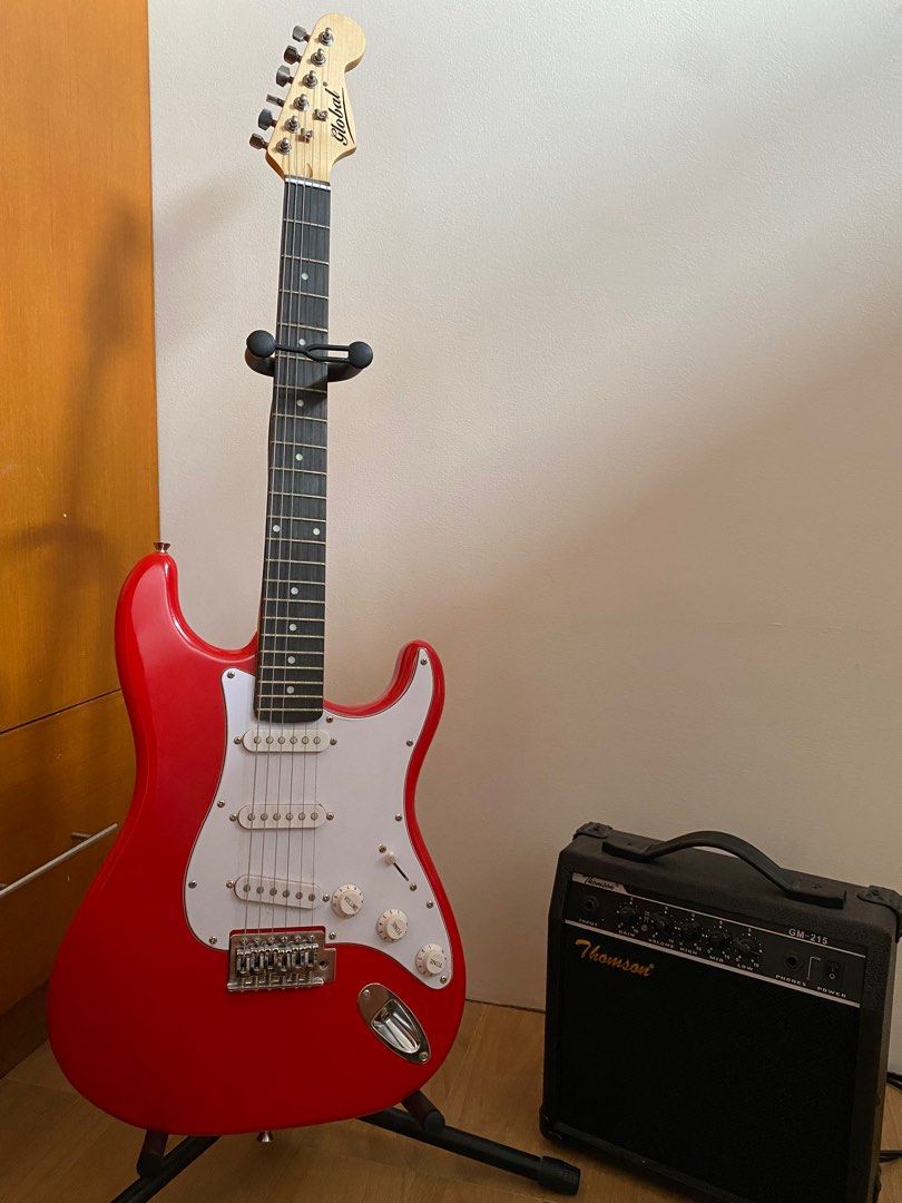 electric guitar set (Category: Musical Instruments) located in Guagua. Submitted by mariana.items (Listing ID 1278120361, Image 1). Description: FOR SALE ELECTRIC GUITAR SET INCLUSIONS: - complete accessories - guitar strap (not visible lang sa pic) - amplifier - guitar stand & cover ✔️ NO ISSUES ✔️ with plastic pa yung guitar body ✔️ condition: 9/10.