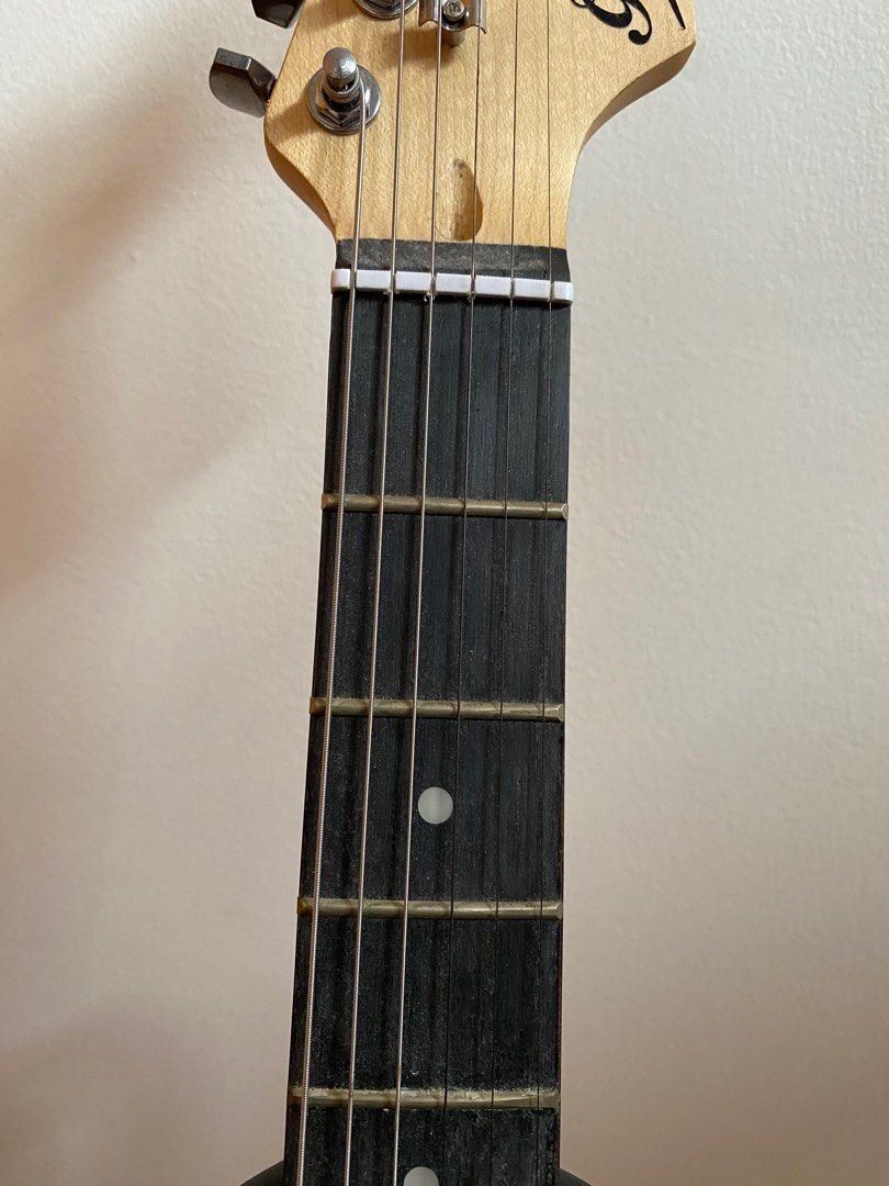 electric guitar set (Category: Musical Instruments) located in Guagua. Submitted by mariana.items (Listing ID 1278120361, Image 3). Description: FOR SALE ELECTRIC GUITAR SET INCLUSIONS: - complete accessories - guitar strap (not visible lang sa pic) - amplifier - guitar stand & cover ✔️ NO ISSUES ✔️ with plastic pa yung guitar body ✔️ condition: 9/10.