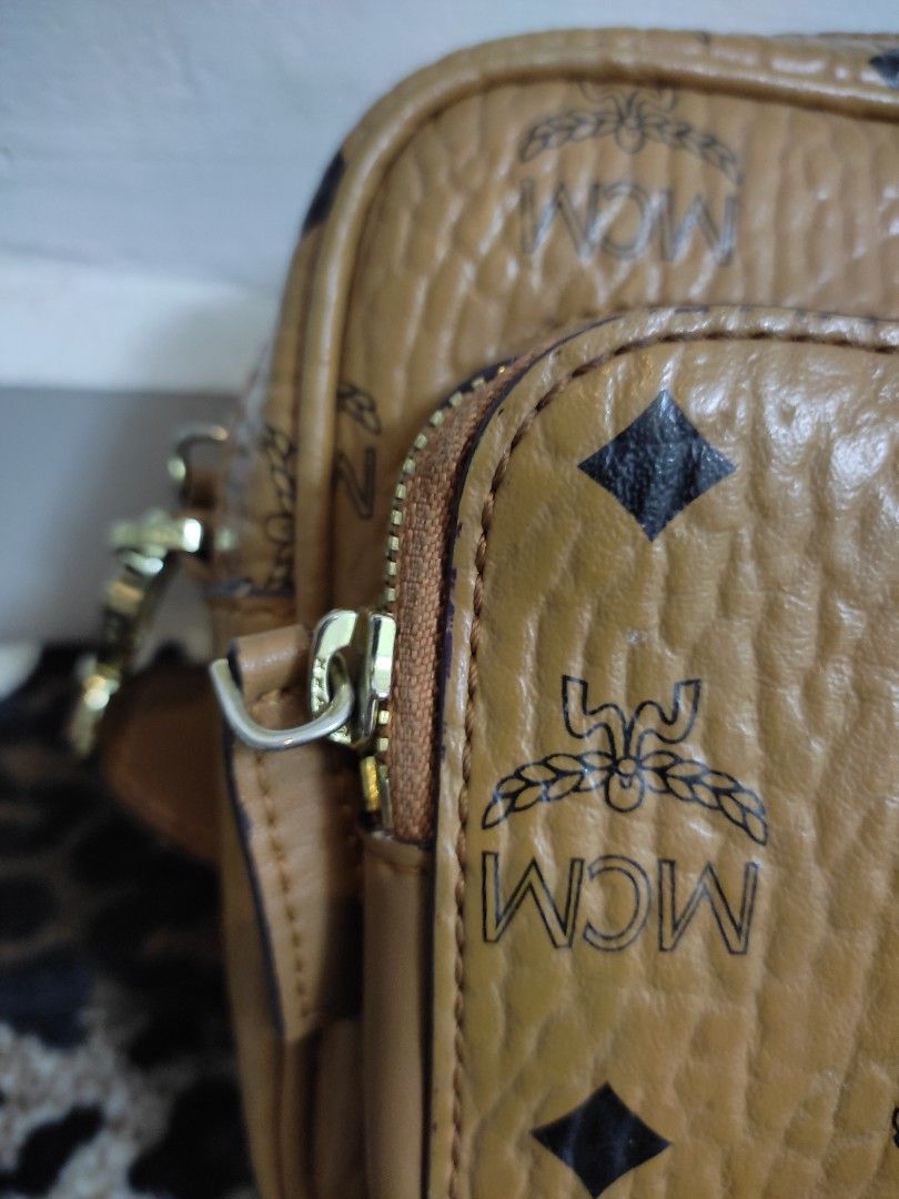 Mcm discount sling backpack