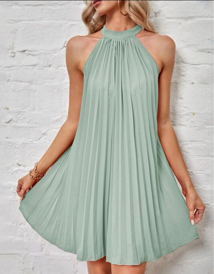 Mint Green Pleated Dress (Category: Dresses) located in Manila. Submitted by fitsdeclutter (Listing ID 1278235929, Image 2). Description: looks pretty when worn! size s worn once only.