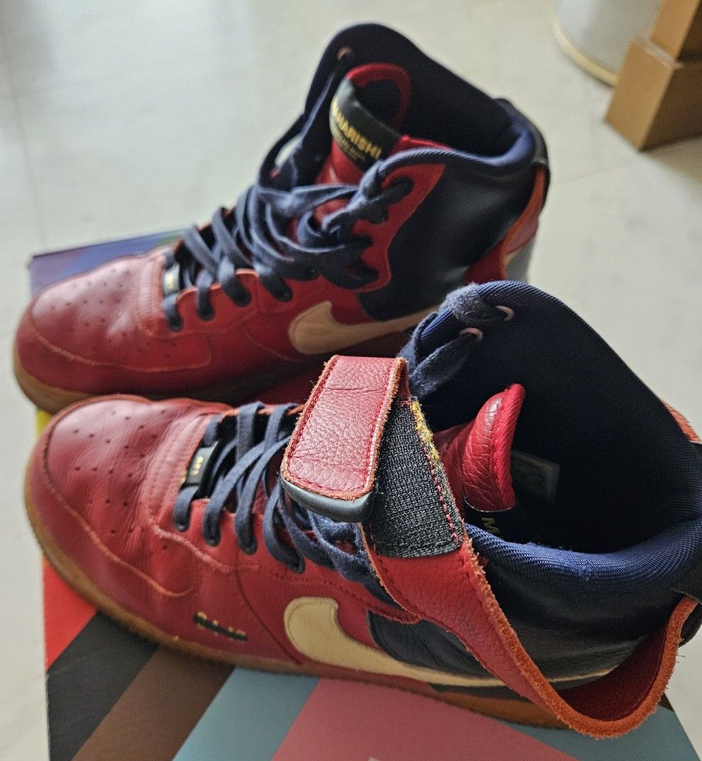 red and blue nike boots