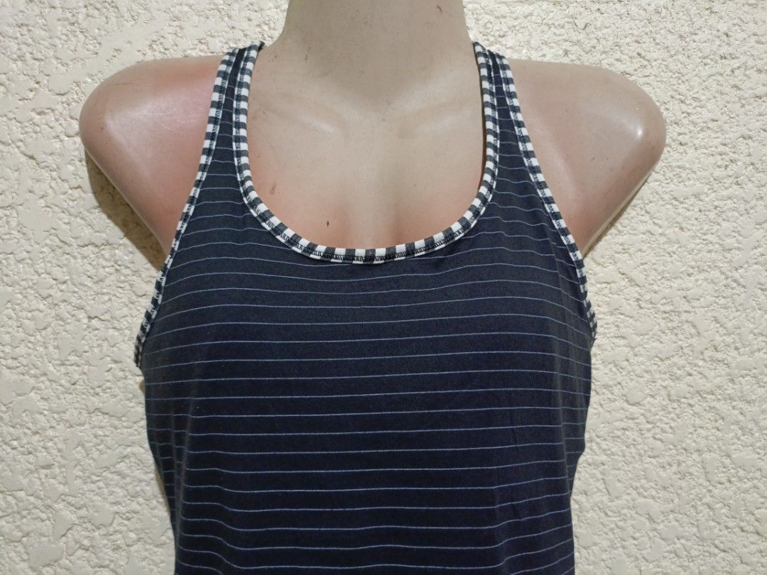 Nike dri-fit racerback tank top medium (Category: Sleeveless) located in Santa Cruz. Submitted by beabagos (Listing ID 1278257605, Image 2). Description: ❗❗❗PLEASE READ❗❗❗ *This item is preloved, please manage your expectations. I don't do return/refund so please always read the description and check the pictures. Flaws are always indicated if there is any.. Nike dri-fit racerback tank top color: black with stripes size: medium on tag (tape measu
