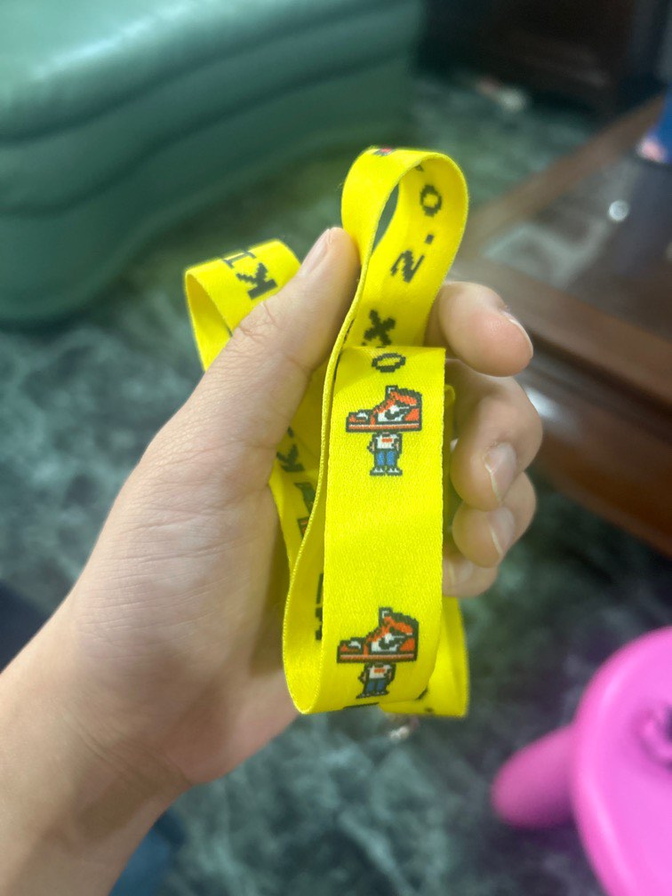 Yellow top nike lanyard
