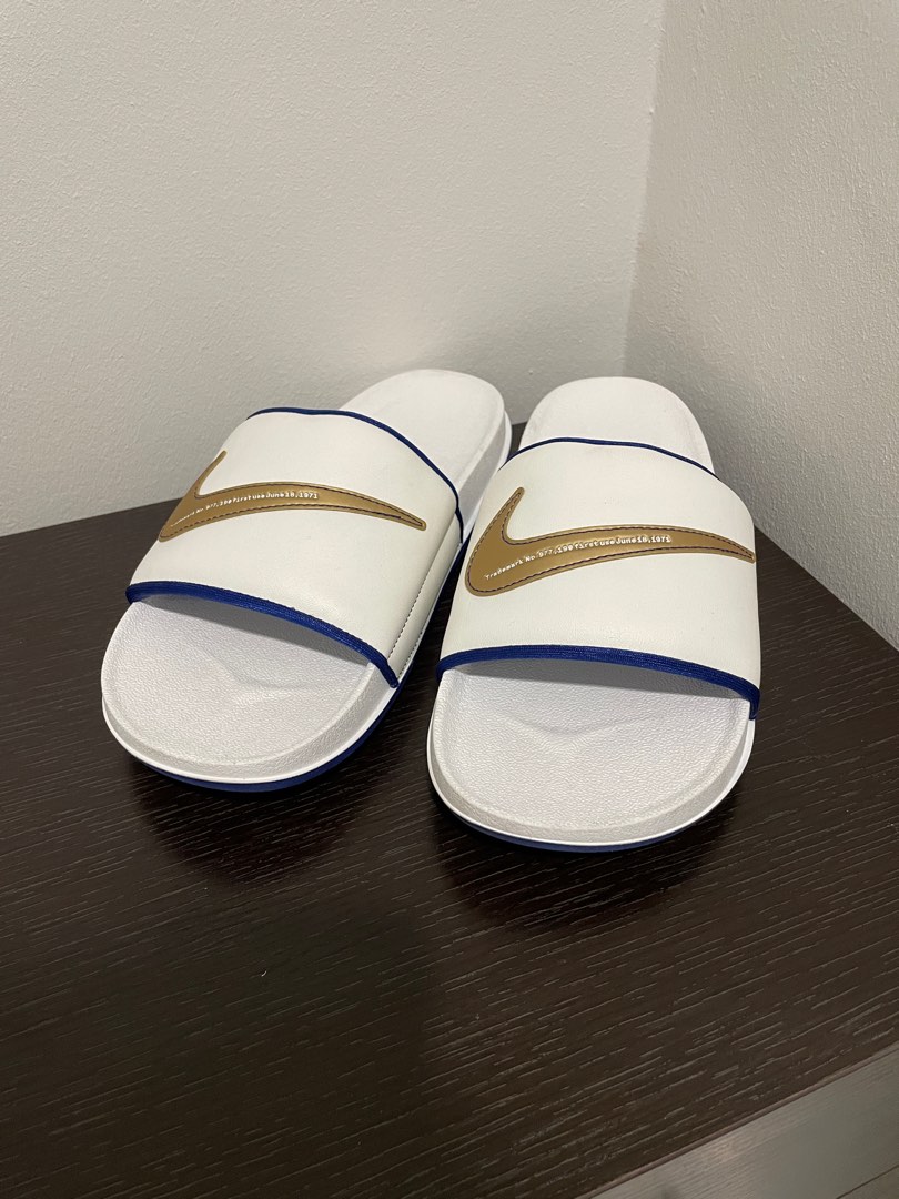 Nike slides deals gold swoosh