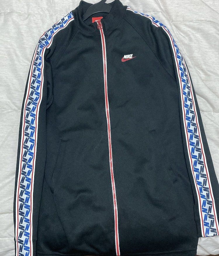 Nike taped track jacket sales