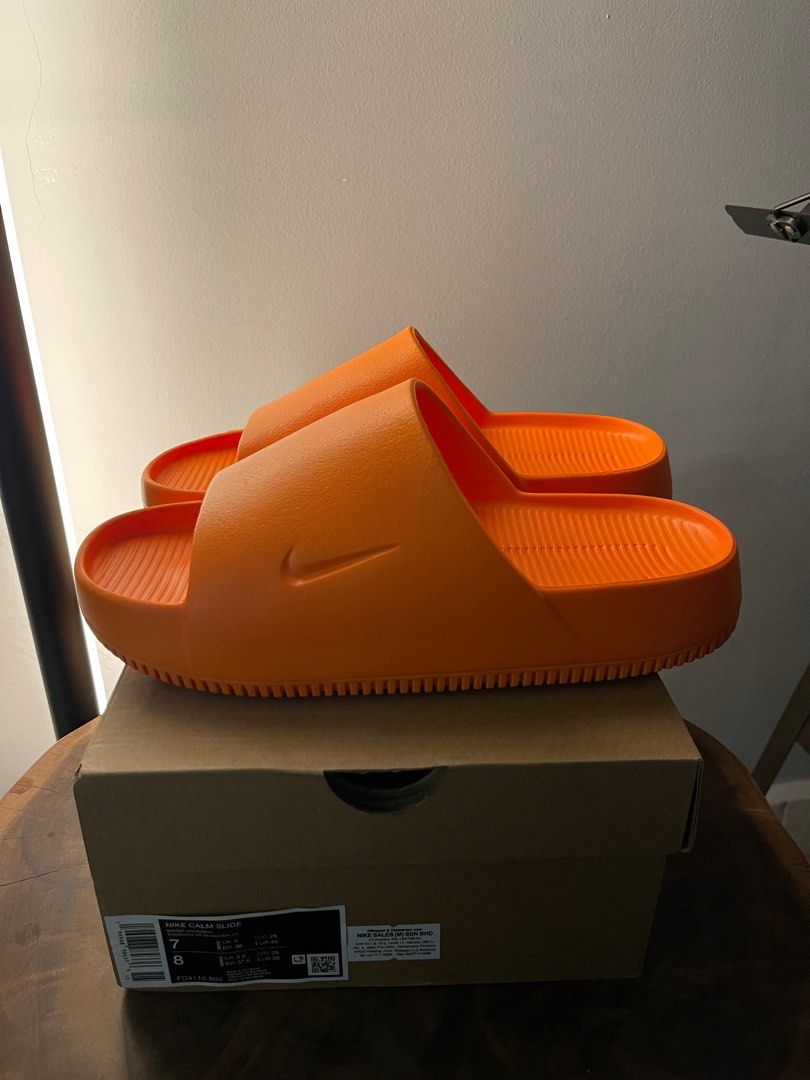 Orange hotsell nike slides
