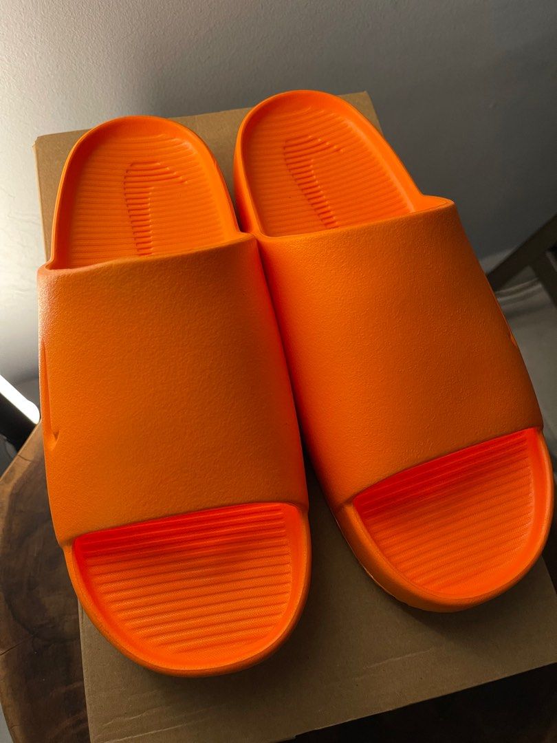 Orange on sale nike slides