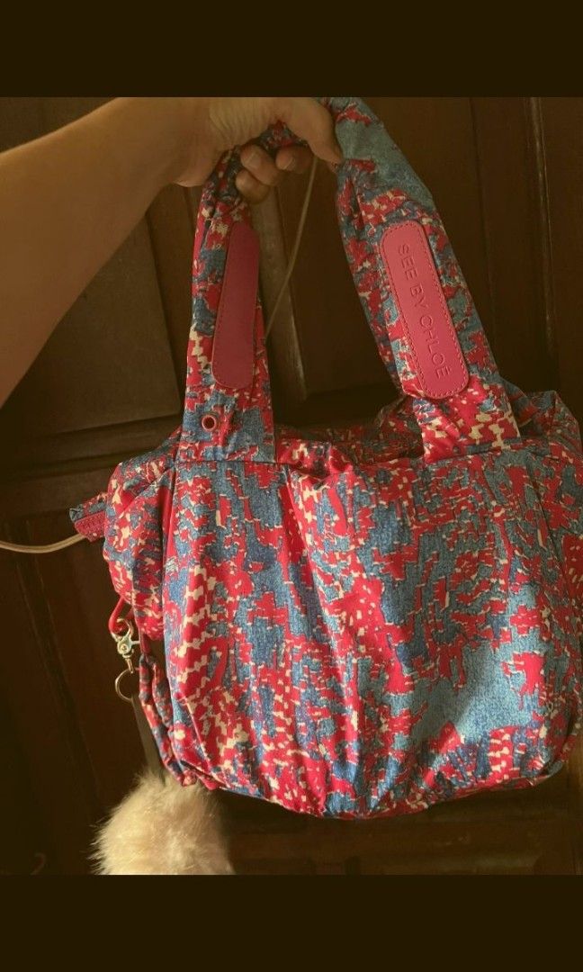 SEE BY CHLOE Shoulder bag (Category: Luxury Bags & Wallets) located in Quezon City. Submitted by uptrendglam (Listing ID 1278248833, Image 1). Description: See by Chloe canvass bag, very light and comes with SBC & mini plush charms (bag inclusion) ISSUE : see last picture.