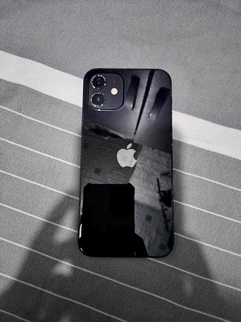 SELLING iPhone 12 64gb RUSH (Category: iPhone 12 Series) located in Mandaluyong City. Submitted by aliaxmadi (Listing ID 1278275412, Image 1). Description: iPhone 12 64gb fu any sim Open for swap sa lower unit add nalang All working po reset all u can 73% bh original test to sawa✅ Truetone & Face id✅ Mandaluyong location pwede meet up any mrt station .