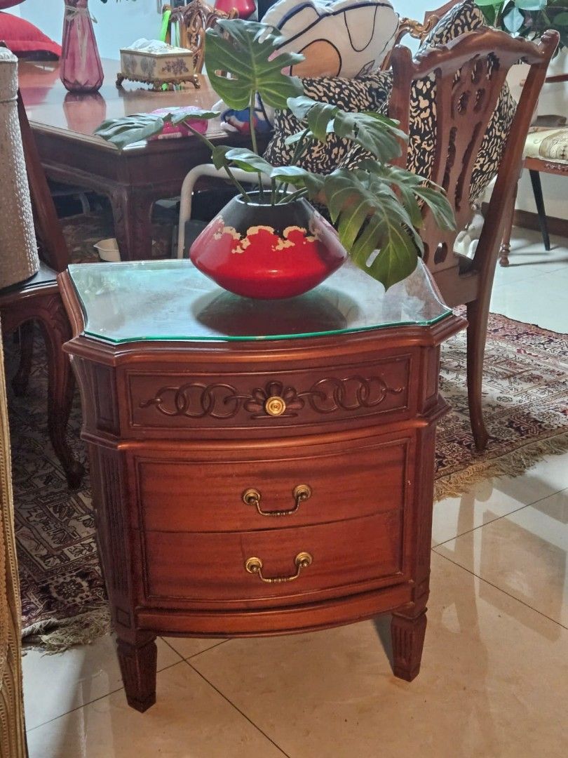 Solid wood side table (Category: Tables & Sets) located in Singapore. Submitted by roseasya (Listing ID 1274769802, Image 1). Description: Solid wood With glass top. size (inches): W= 16 B=22 H=25 self collection please. thank u..