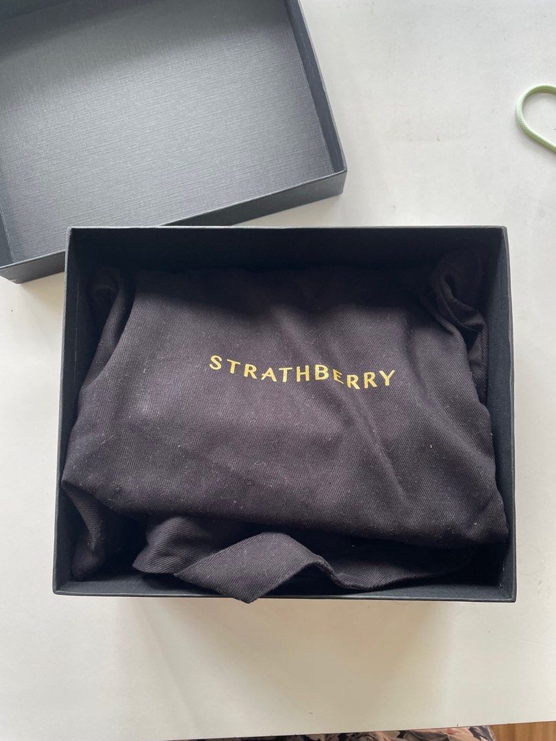 Strathberry East/West Mini in Black (Category: Luxury Bags & Wallets) located in Cebu City. Submitted by paimon6131 (Listing ID 1278134200, Image 2). Description: ❗️AUTHENTIC STRATHBERRY❗️ - Used twice - No issues - Bought it in their official website MOP: Bank transfer, GCash Payment before shipping *Buyer handles shipping fee Location: Cebu, can ship nationwide via LBC .
