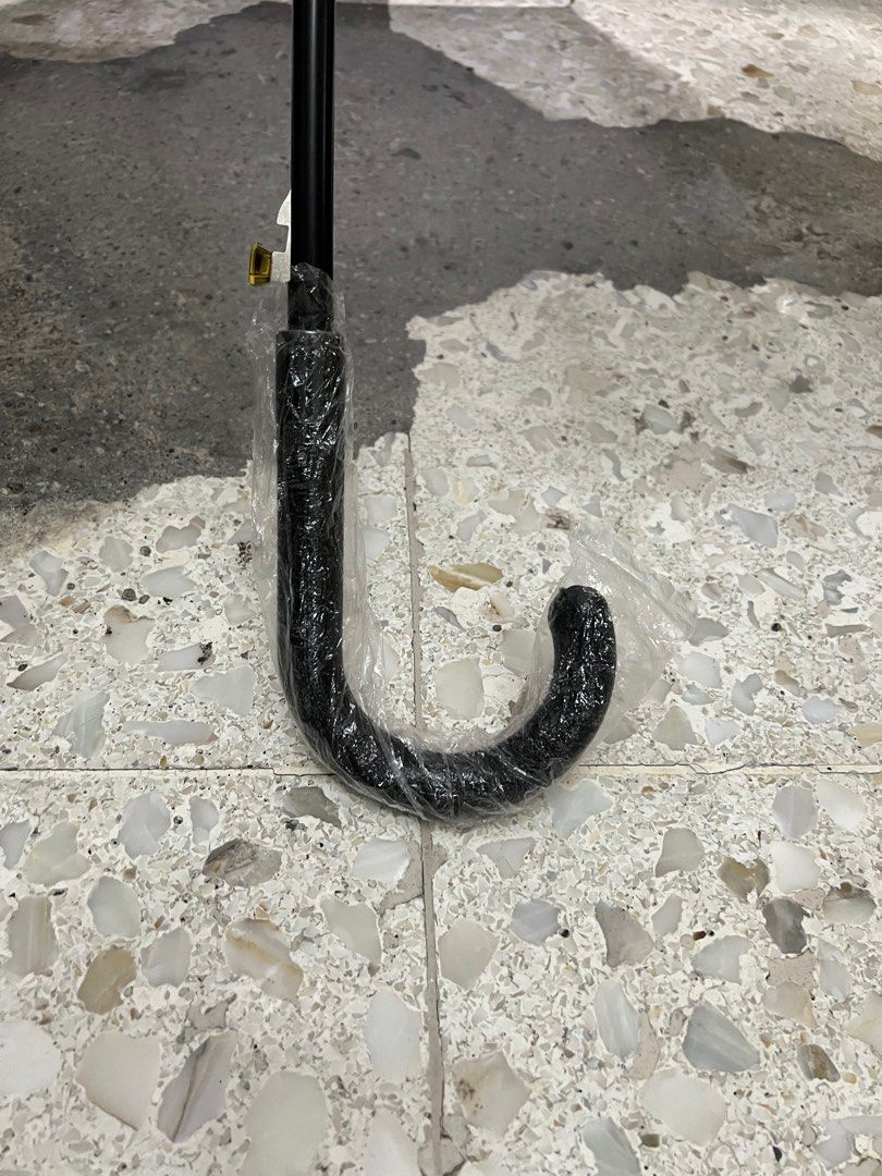 White umbrella with leather hook (Category: Umbrellas) located in Quezon City. Submitted by maki1505 (Listing ID 1278169250, Image 3). Description: Automatic open 34 inches long.