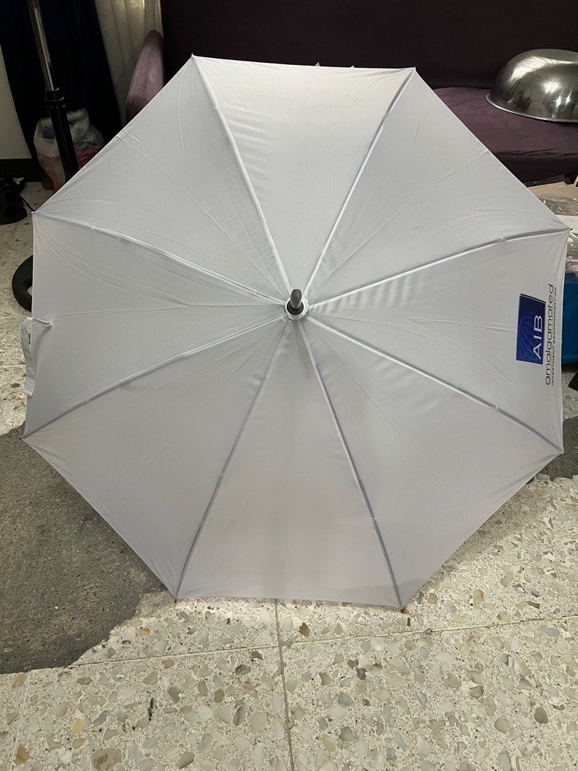 White umbrella with leather hook (Category: Umbrellas) located in Quezon City. Submitted by maki1505 (Listing ID 1278169250, Image 1). Description: Automatic open 34 inches long.