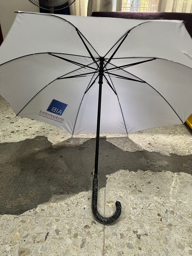 White umbrella with leather hook (Category: Umbrellas) located in Quezon City. Submitted by maki1505 (Listing ID 1278169250, Image 2). Description: Automatic open 34 inches long.