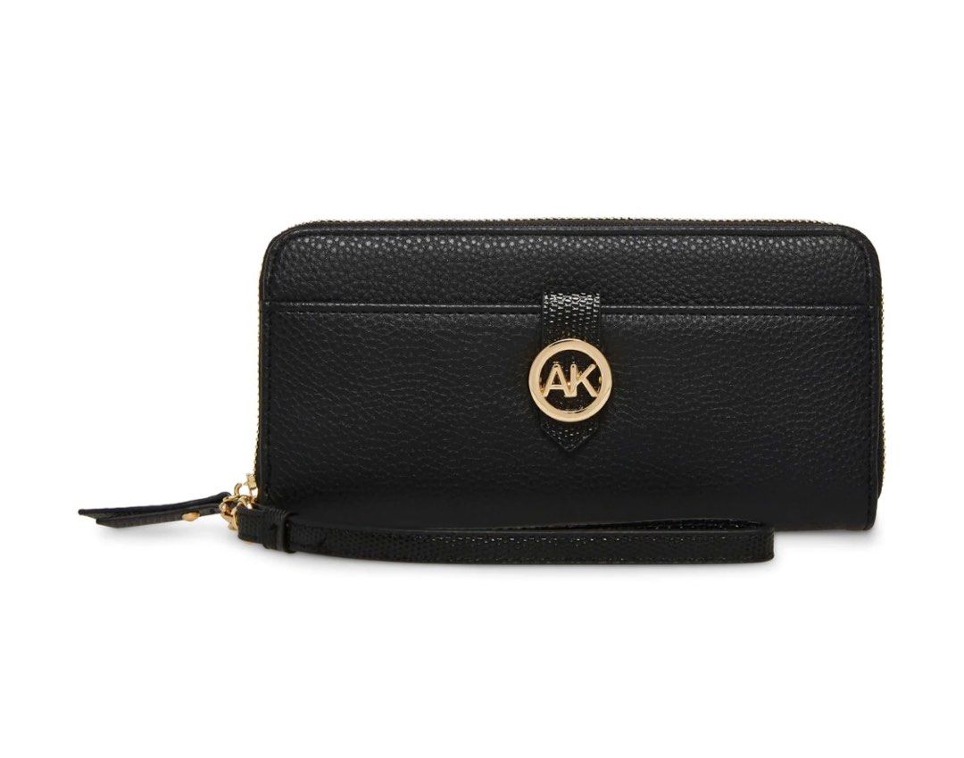 Anne Klein (Category: Luxury Bags & Wallets) located in Del Monte. Submitted by loryelletee (Listing ID 1278518450, Image 1). Description: 💚 Anne Klein Zip Around Wallet 💚Brand new with tag 💚100% Authentic 💚Freah from U.S 💚On Hand 💚Php 1,700 💚DESCRIPTION This AK zip around wallet has subtle brand detailing which doubles as a closure for the front slip pocket. This wallet also has plenty of organization functionality including a center zip 