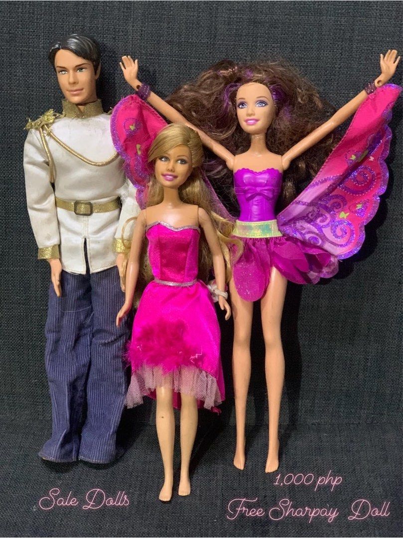 Assorted Barbie & Ken SALE! (Category: Figurines & Statues) located in Davao. Submitted by riccirici (Listing ID 1278588487, Image 2). Description: Ken Doll W Flaws Eyes faded/erased Neck (head connector damaged/broken) Finger is cut Barbie Fairy Secret Cracked neck Sharpay Doll Free Please check the photos carefully before buying. Selling as is. Price 1,000 php NOW 750 php Add SF J&T, JRS Bank Transfer, Gcash .