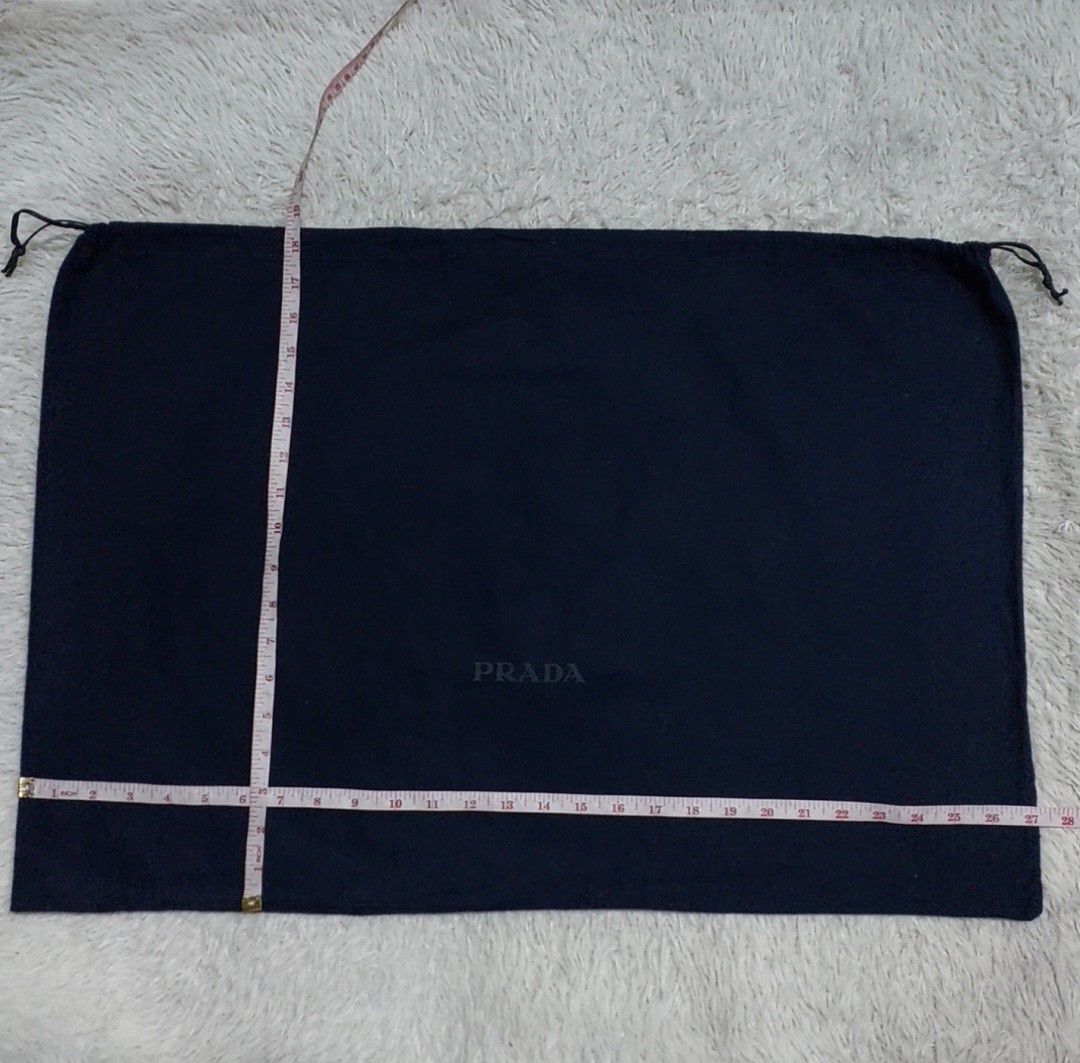 Authentic Prada dust bag 18.5x27 inches (Category: Luxury Bags & Wallets) located in Manila. Submitted by jfluxury.co (Listing ID 1278507295, Image 3). Description: excellent condition no flaws bought in Japan 🇯🇵 💯% Authentic. 😊 Money back guarantee. 😊 Clean and ready to use na po.