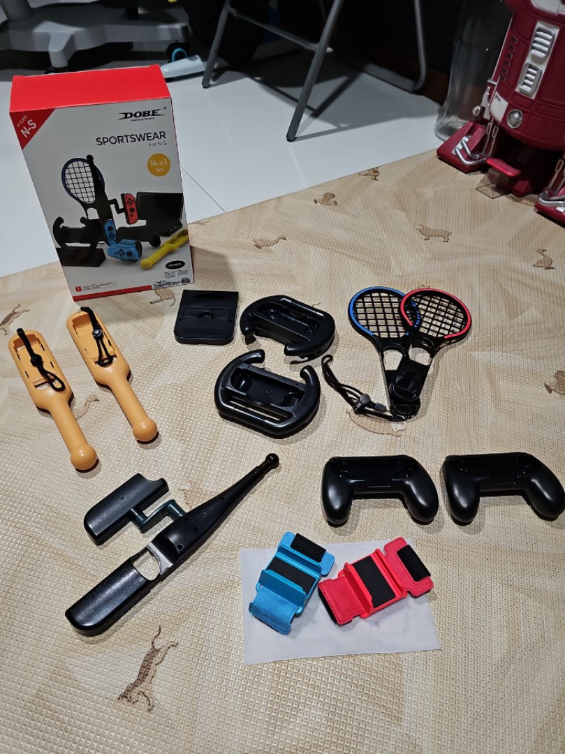 Dobe Nintendo Switch Sportswear Accessories - Fishing Rod / Folding Stand /  Drum Stick / Tennis Racket / Racing Wheel / Controller Grip / Hand Strap,  Video Gaming, Gaming Accessories, Controllers on Carousell