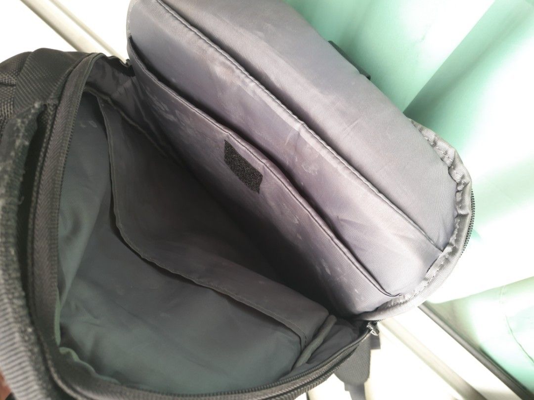 Backpack with zippered new arrivals side pockets
