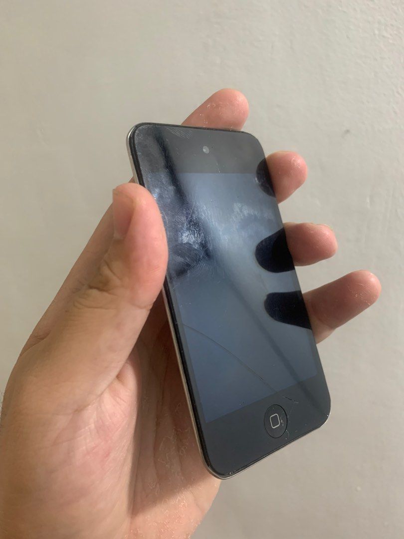 iPod touch 4th gen 8gb (Category: Portable Music Players) located in Bulacan. Submitted by apple_siri (Listing ID 1278501500, Image 3). Description: Issue gray spot and hairline sa lcd home button lubog pero may assistive touch naman power button goods may songs ng nakalagay gagamitin na lng.