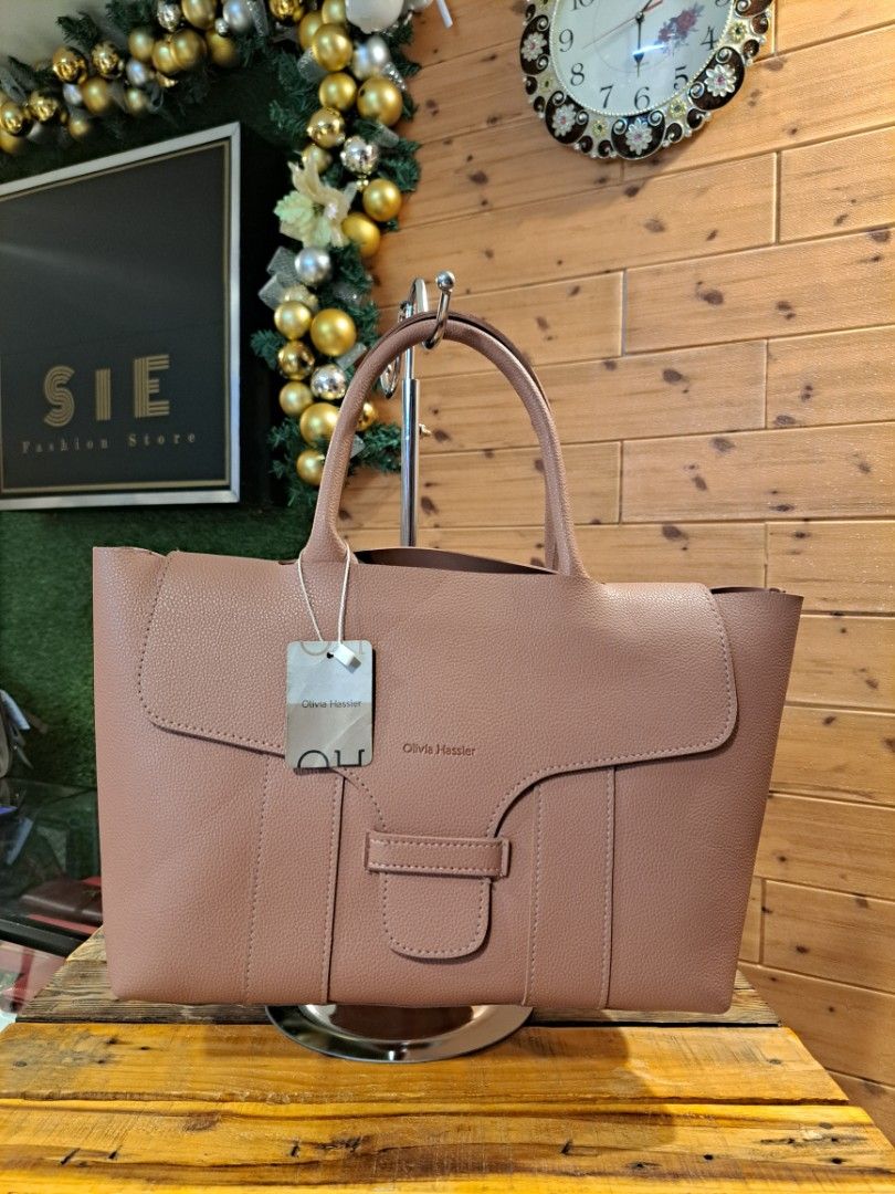 Olivia hassler bag price 2025