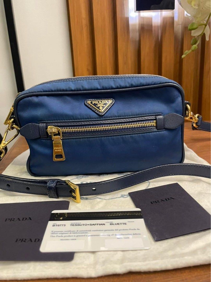 Prada Tessuto Blue Nylon Sling / Saffiano Strap (Category: Luxury Bags & Wallets) located in Manila. Submitted by bagislifeshop (Listing ID 1270707014, Image 1). Description: ON HAND IN PH 🇵🇭 100% Authentic Prada Tessuto Blue Nylon Sling / Saffiano Strap Condition 8/10 Comes with Dustbag and Authenticity Card .