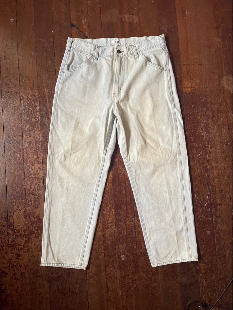 Uniqlo U Jeans (Category: Jeans) located in Quezon City. Submitted by _pbmt (Listing ID 1278450363, Image 1). Description: Pants generally fit on the baggier side but not too much. Fits roomy around the thigh and tapers at the hem. Front and back pockets are spacious. The color is in a very pale blue with some yellowing. Only issue is a small scuff on the right leg, shown in the last slide. Waist: 35 Length: 40 Rise: 13 Knee: 11.5 Opening: 8.