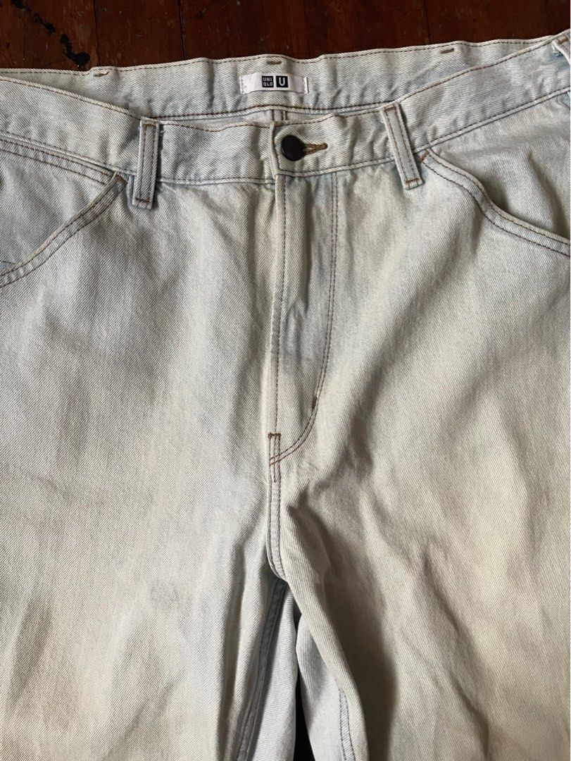 Uniqlo U Jeans (Category: Jeans) located in Quezon City. Submitted by _pbmt (Listing ID 1278450363, Image 3). Description: Pants generally fit on the baggier side but not too much. Fits roomy around the thigh and tapers at the hem. Front and back pockets are spacious. The color is in a very pale blue with some yellowing. Only issue is a small scuff on the right leg, shown in the last slide. Waist: 35 Length: 40 Rise: 13 Knee: 11.5 Opening: 8.
