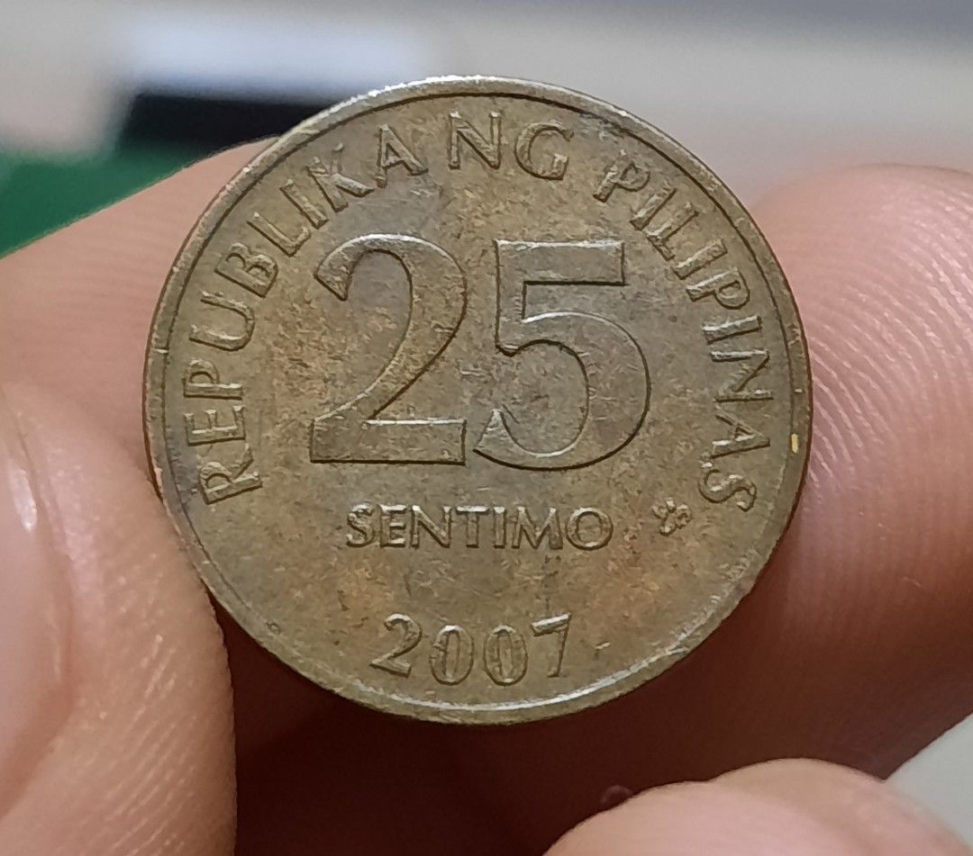 2007 25 sentimo coin small text reverse (Category: Currency) located in Las Pinas. Submitted by lbays_mint (Listing ID 1278705449, Image 1). Description: 2007 25 sentimo coin small text reverse. Only 2% were produced. DELIVERY via LBC/LALAMOVE.
