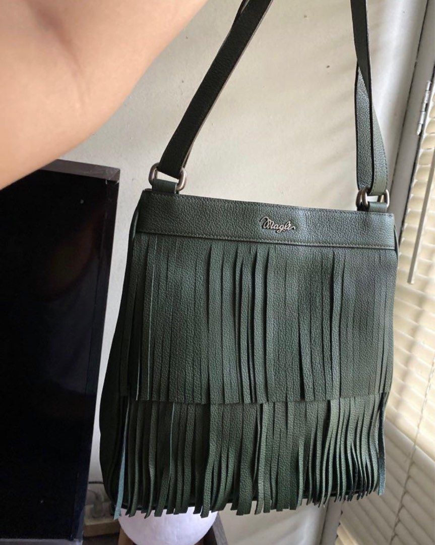Bruno Magli fringe bag (Category: Cross-body Bags) located in Manila. Submitted by mawscloset (Listing ID 1278825449, Image 1). Description: Authentic leather .
