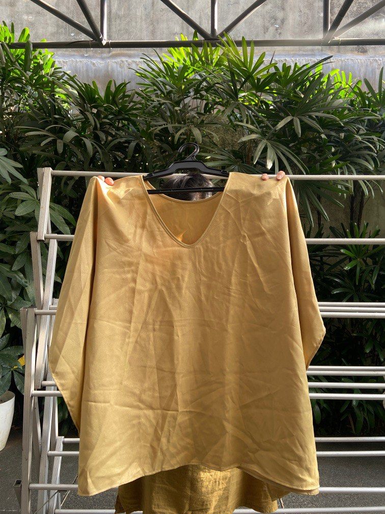 CUSTOM Elegant Light Yellow Brown Loose Blouse (Category: Blouses) located in San Juan City. Submitted by studioep (Listing ID 1278762746, Image 1). Description: * color may vary due to lighting * perfect for casual and formal events and very comfortable fit * custom made free size but fits medium to large * RFS: decluttering * Notes: no haggling please :( best price! :) * Delivery shall be via Grab/Lalamove (no meet ups or other couriers) * Paym