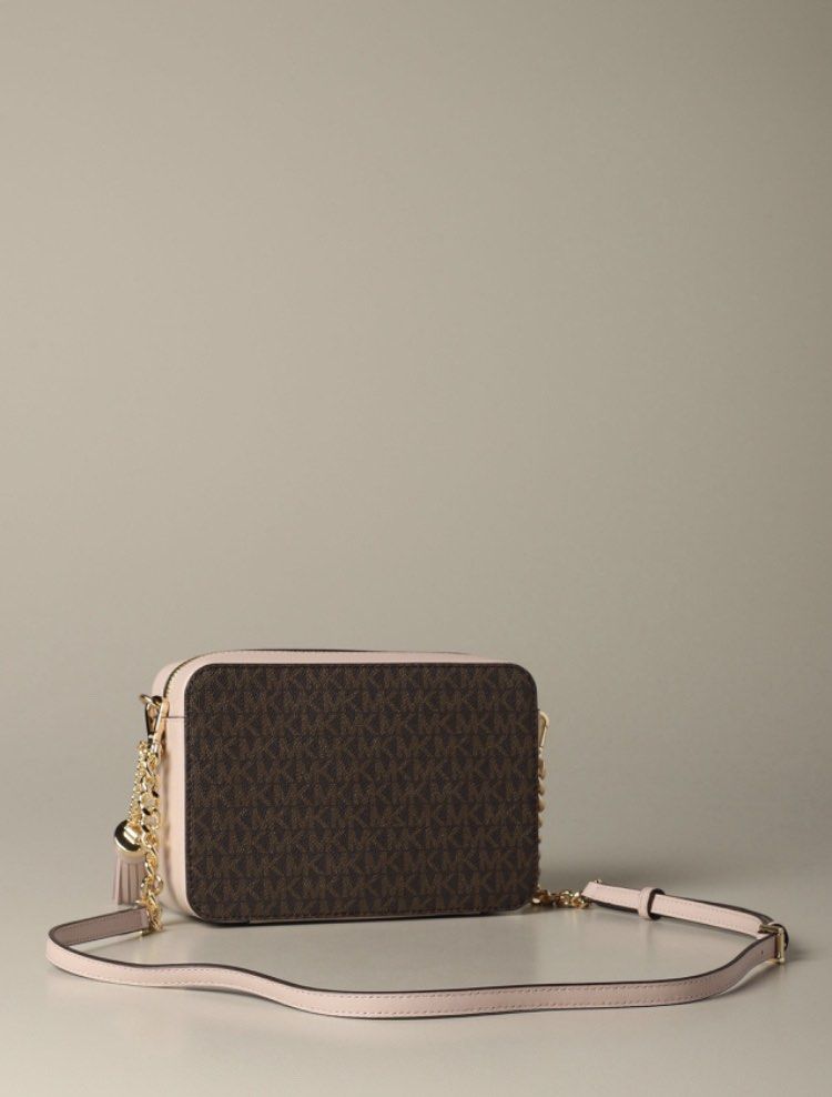 Michael Kors Jet Set Medium Crossbody with Tassel (Category: Cross-body Bags) located in Paranaque City. Submitted by michfinds (Listing ID 1278802831, Image 2). Description: Brand new, never used 💯 Authentic, store bought Color: Pink and Brown Monogram with Gold Hardware Material: Genuine Leather Style: MK Jet Set Medium Logo Travel Crossbody w/ Tassel *with detachable strap *can be used as sling, crossbody, or clutch - one inner zipped pocket 