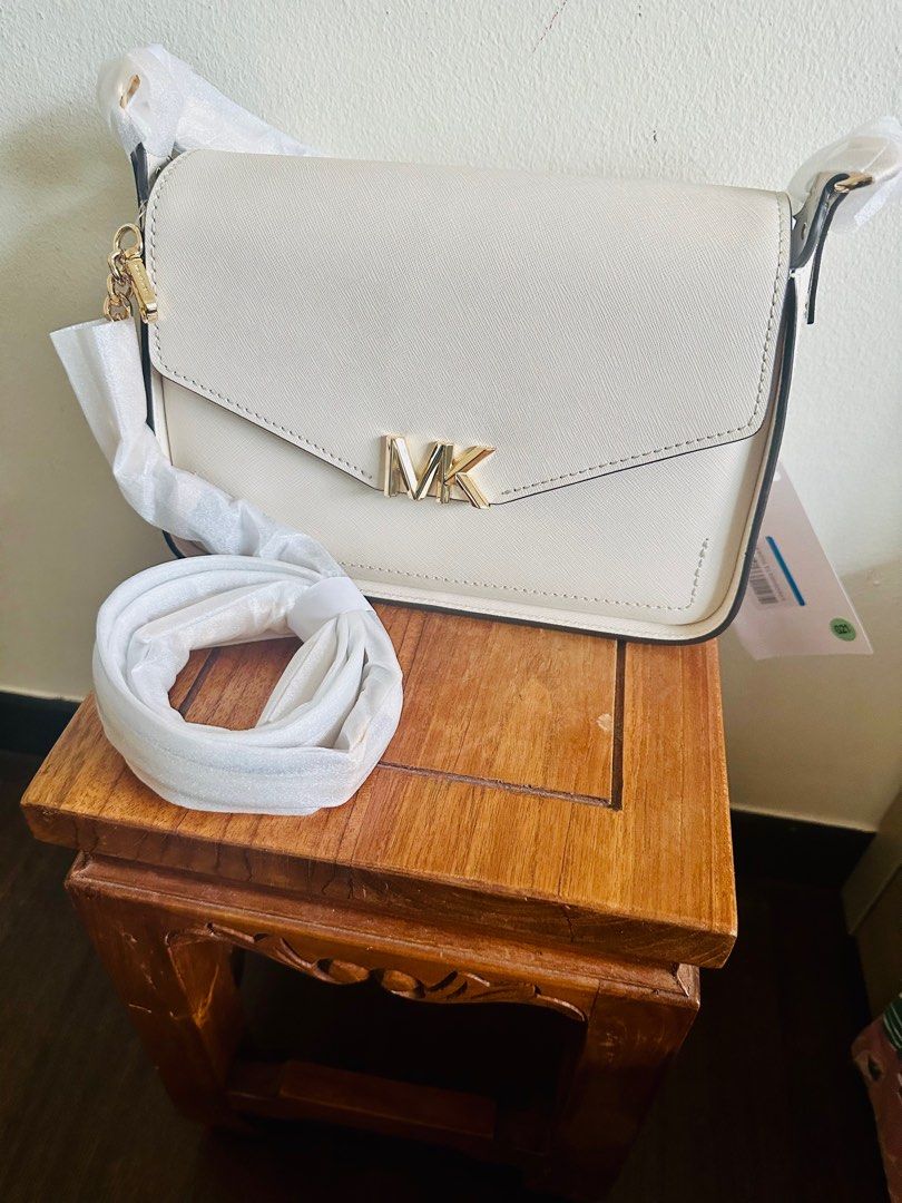 Michael kors crossbody cream deals