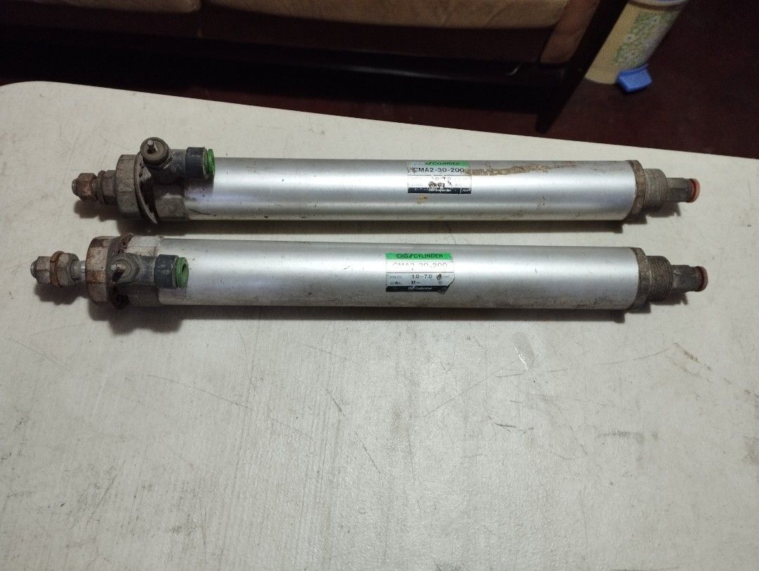Pneumatic cylinders 30x200 CKD brand (Category: Industrial Equipment) located in Manila. Submitted by bokness (Listing ID 1278768304, Image 1). Description: Excellent condition. Used in prototyping only. Price is for both cylinders. CKD brand Japan 30mm piston x 200mm stroke.