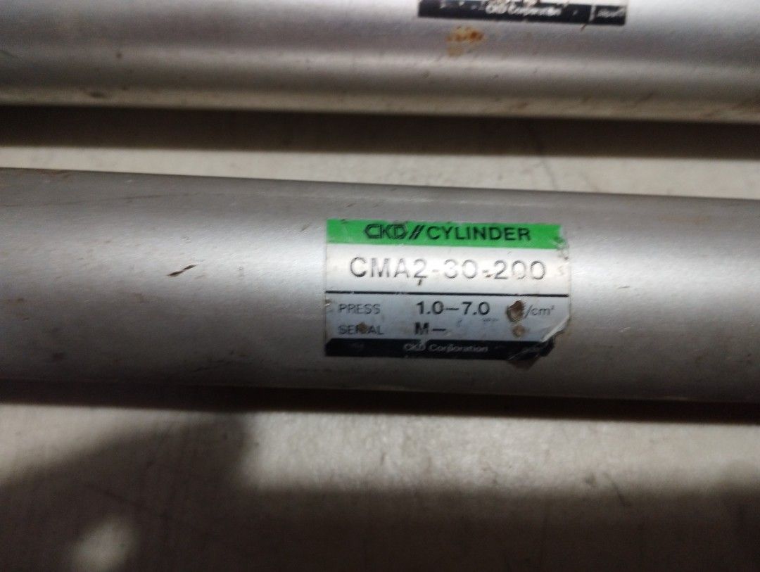 Pneumatic cylinders 30x200 CKD brand (Category: Industrial Equipment) located in Manila. Submitted by bokness (Listing ID 1278768304, Image 2). Description: Excellent condition. Used in prototyping only. Price is for both cylinders. CKD brand Japan 30mm piston x 200mm stroke.