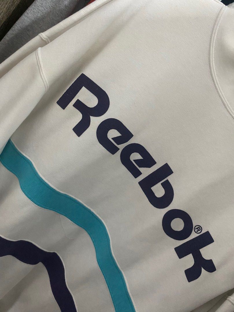 Reebok Sweater (UNISEX) (Category: Coats, Jackets and Outerwear) located in Manila. Submitted by de.clutterthings (Listing ID 1278738376, Image 3). Description: comfy sweater *✲ﾟ*｡ • size: S-M (can be oversized for size S; im an S) • perfecf in cold weathers! • rfs: decluttering! • don’t mine the beige collar underneath the sweater. naka hanger lang sila :) •flaws: not noticeable. (see last pic) .